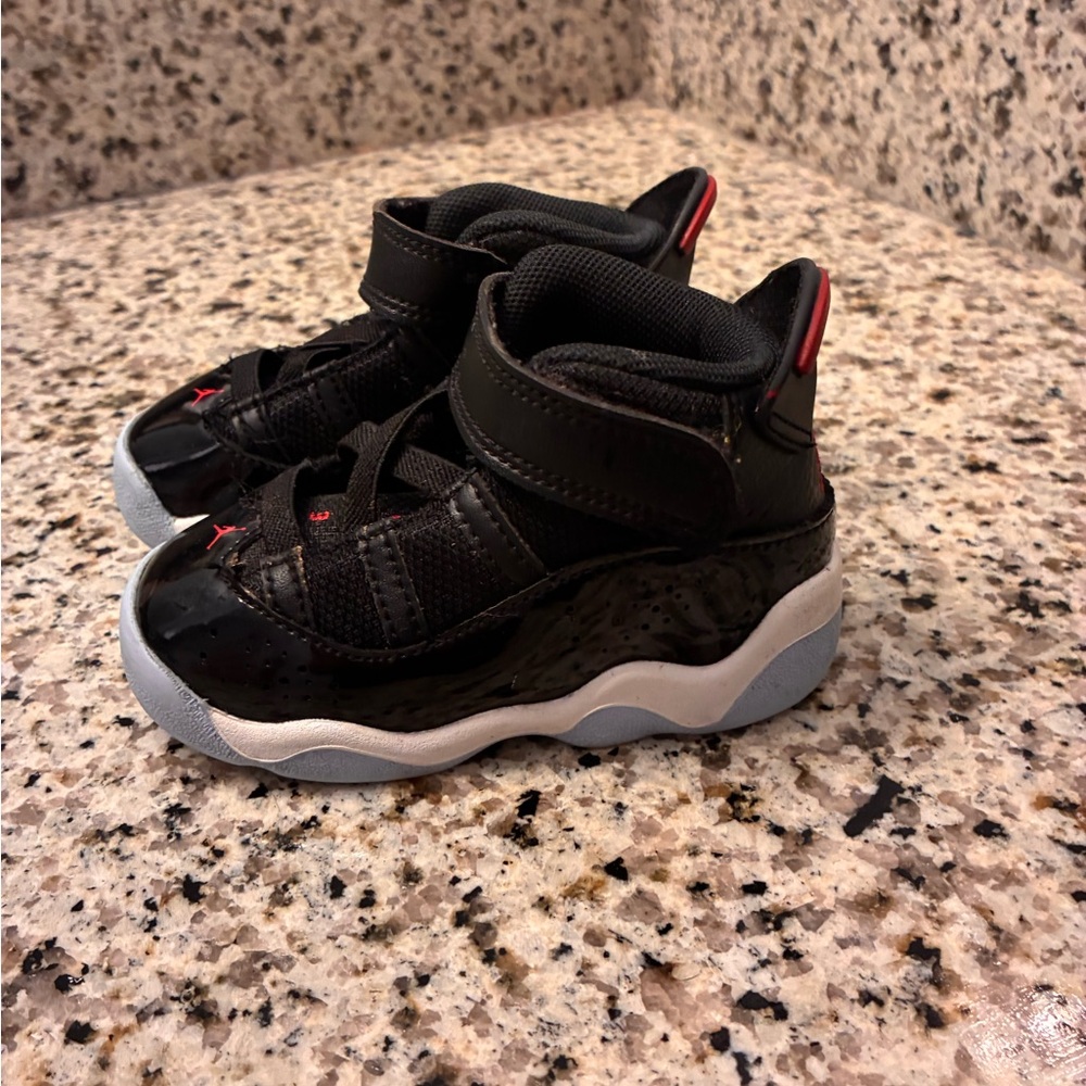 Kids Black and Red Jordan Sneakers